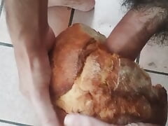 Cumming inside loaf of bread