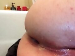 'Playing with cum in my ass from BBC'