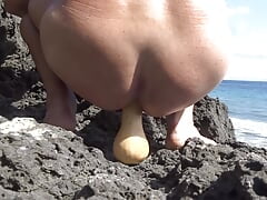 Ass on the rocks