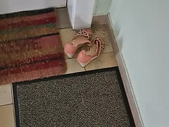 Cum into stil warm shoes of m neighbour in the hallway