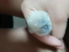 Chinese boy cumming in condom with tight cock ring