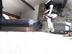 Sissy Staci in her maids uniform cleaning the house