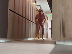 Naked dog in gym locker