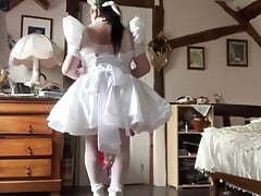 In a short wedding dress outfit to become a maid for a day