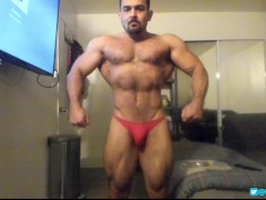 'Oiled up straight bodybuilder shows off muscles and huge ass'